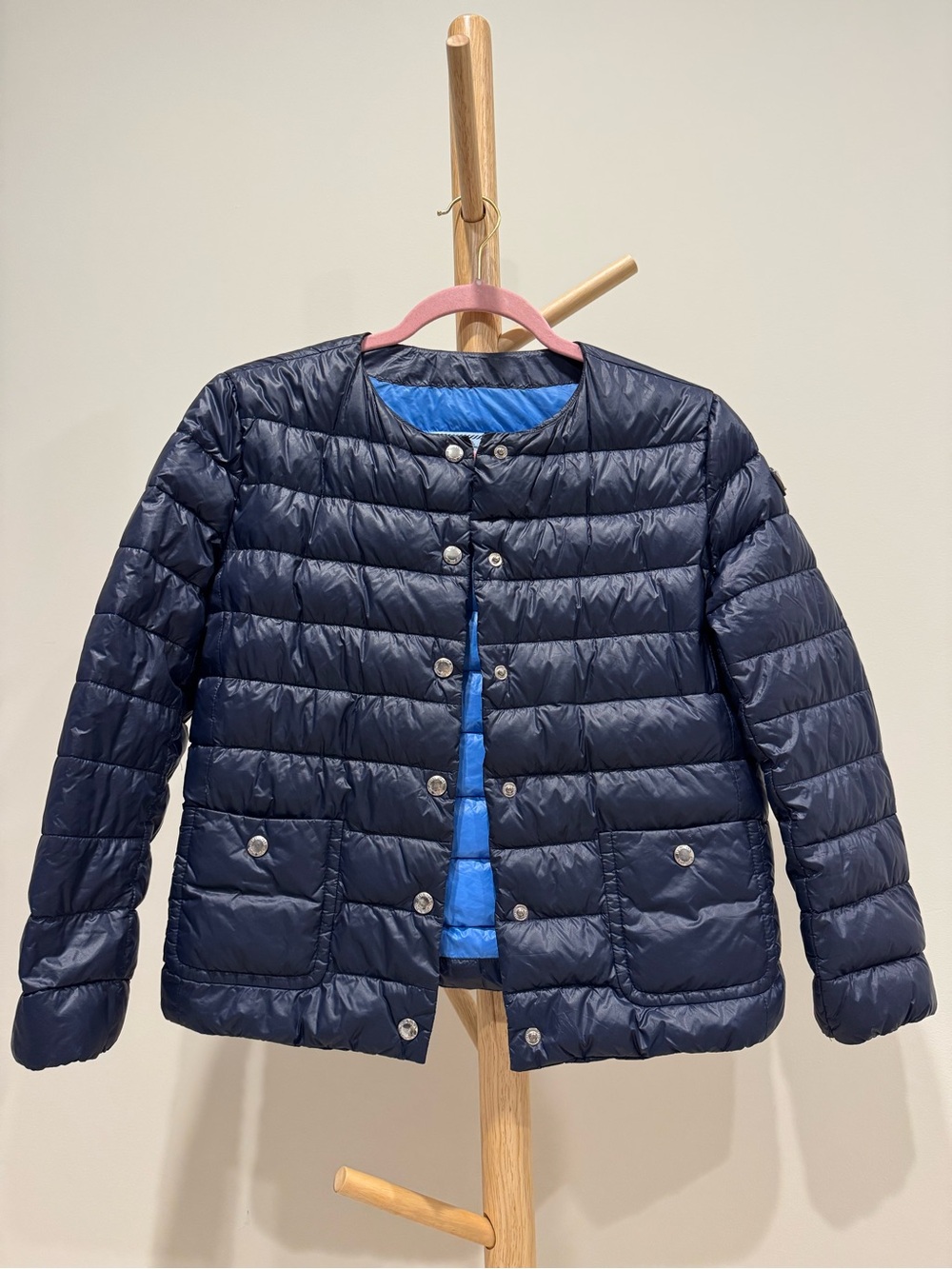 Prada Navy Puffer Jacket 3/4 sleeve arm.